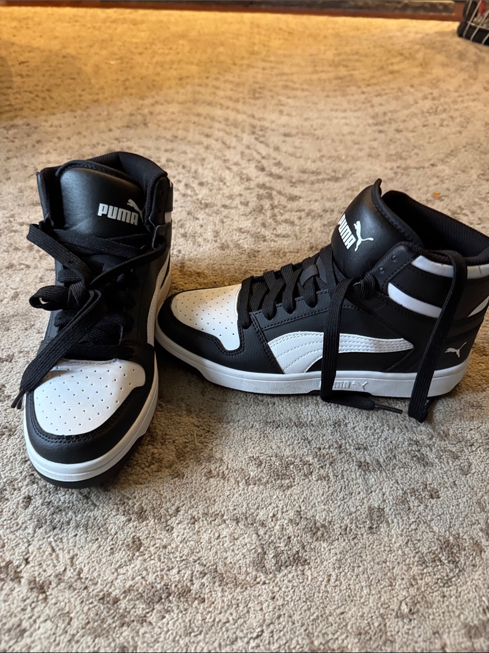 Puma Black and White Mid-Top Sneakers